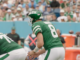Aaron Rodgers Throws 500th Touchdown, Shines in Potential Farewell Performance