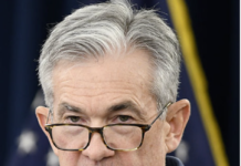 Fed Holds Interest Rates Steady as Powell Signals Cautious Approach Amid Economic Uncertainty