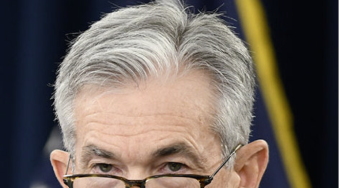Fed Holds Interest Rates Steady as Powell Signals Cautious Approach Amid Economic Uncertainty